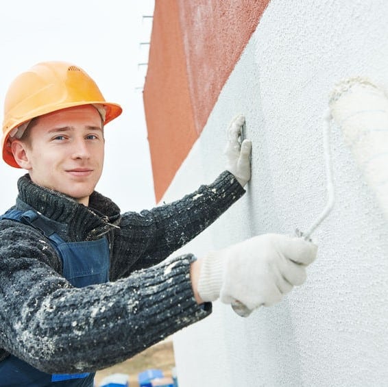 builder facade painter at work